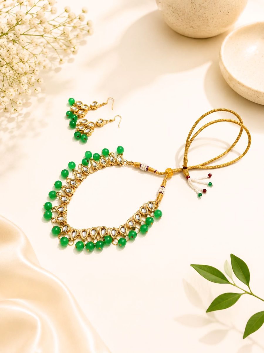 Traditional green Kundan jewellery set with matching earrings