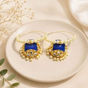 Blue pearl hoop jhumka earrings with gold plated detailing and pearl accents