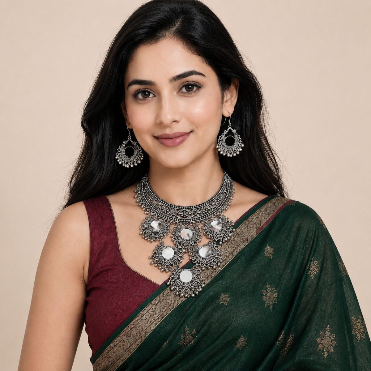 Women wearing mirror necklace set with earrings