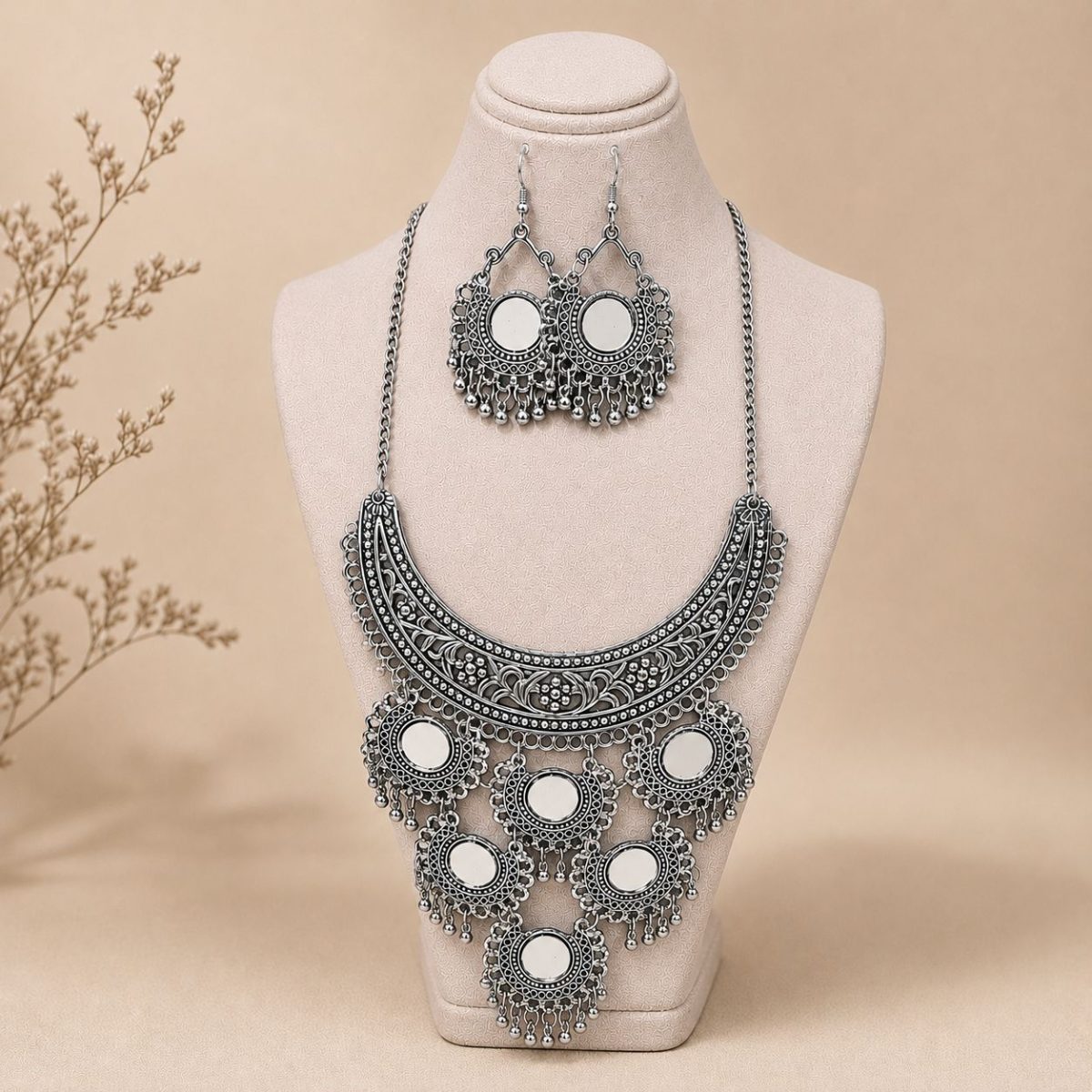 mirror necklace set with earrings on stand front view