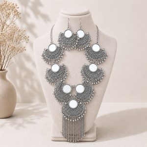 mirror necklace set on white stand front view